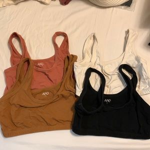 Four shopARQ wide strap bras.